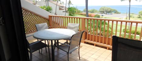 Ocean view lanai with electric awning to shade the afternoon sun.