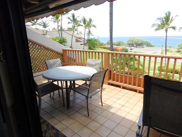 Ocean view lanai with electric awning to shade the afternoon sun.