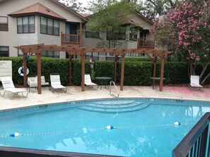 Poolside Lounging at Harbour Oaks - Unwind poolside under the shaded pergolas at Harbour Oaks, just minutes from coffee at Palm Coast and sunsets on the St. Simons Island pier.