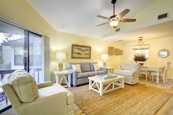 Living and Dining Area at 406 Harbour Oaks - Bright, open living and dining space at 406 Harbour Oaks, perfect for relaxing after a beach day or walking back from dinner at Barbara Jean’s.