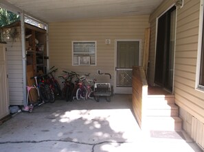 Sliding Door, 3rd Bedroom Front Door, Bikes, & Luggage Cart!