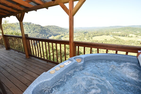 Hot tub on the covered deck - soak up the view and the stars 