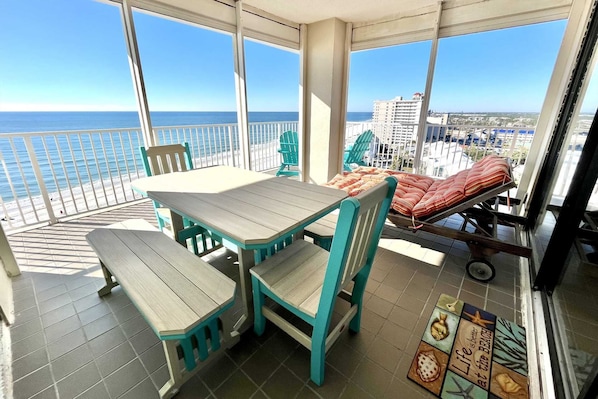 Lounge on your private balcony with a good book and views of the coastline.  Seating for many while watching the waves!