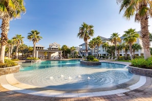 Resort Style Pool with Child Wading Area and Bathhouse Cottages at Romar C3 Orange Beach Alabama