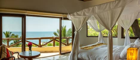 2nd floor bedroom with balcony and palapa
