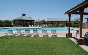 One of three swimming pools & hot tubs at this Golf Course Community!