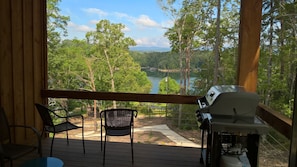 Upper Covered Porch adjoins Kitchen, Weber Genesis II Grill. Paved Path to Lake