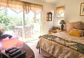 Master Bedroom with large private  patio; decorated with original art
