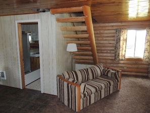 HideABed couch for extra sleeping space and bathroom entry