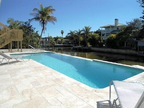 Large south-facing pool deck area. Proper pool loungers provided.