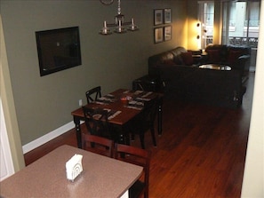 Looking from kitchen into dining and living area.