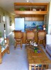 Kitchen and dining bar for ease of serving and visiting island style