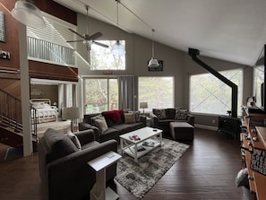 Open floorplan with windows across the entire back.