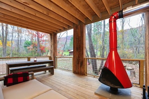 Large rustic modern porch with mountain views