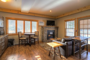 Living Room w/ Fireplace & TV