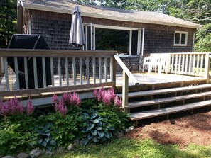 Deck of cottage with grill