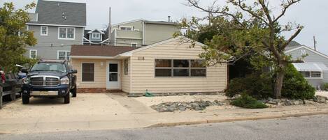 Front of house, off street parking for 4 cars; close to beach.