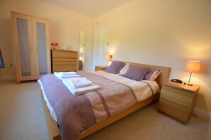 The master bedroom has a full en suite with large bath and WC