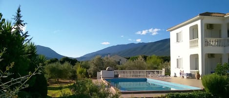 The Walnut Tree Villa, swimming pool and gardens towards Mount Aenos 