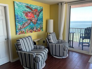 Swivel and rocking chairs in sitting area