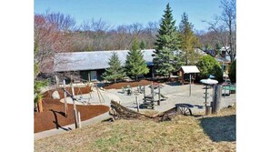 Back view of the Lodge. Let the kids play on the big playground!