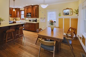 Dining room table expands to seat 8