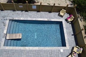 A view from the top deck, beautiful new cement pool. 
