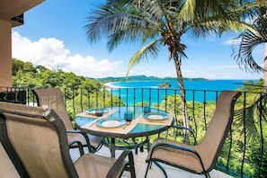 Private balcony with ocean view and sitting area