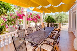 The outdoor shaded patio area for enjoying dining in the fresh air