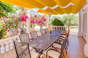 The outdoor shaded patio area for enjoying dining in the fresh air