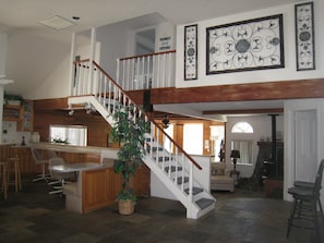Entry with sunken living room in background