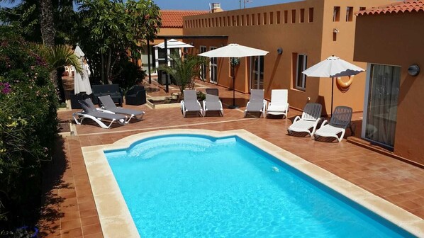  All bedrooms open out to the pool are.