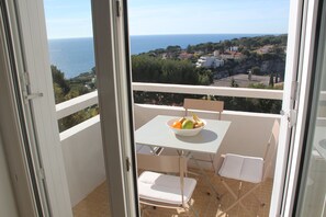 looking out from the bedroom to the balcony