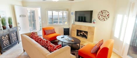 View of the living room with the ocean just outside the window