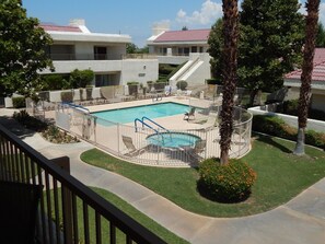 Pool and Hot tub area, view off of the rear balcony.