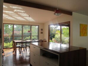 Inside looking outside! Tasteful, timber-finished, north-facing living spaces