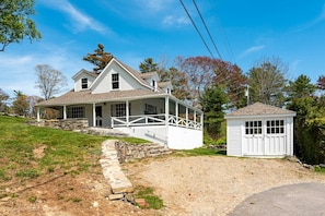 Driveway area with spacious newly renovated garage sitting room