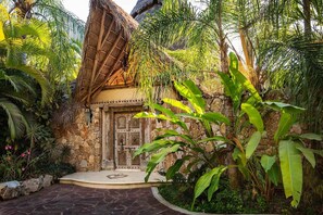 Tropical modern architecture, using  local materials, surrounded by nature.