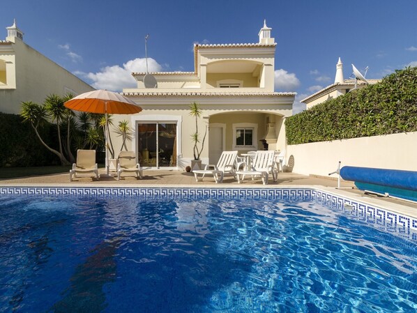 South facing pool in enclosed private grounds . 