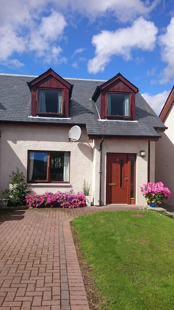 Driveway for two vehicles and entrance to property. 