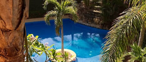 The Lovely view down to our pool from our master bedroom...