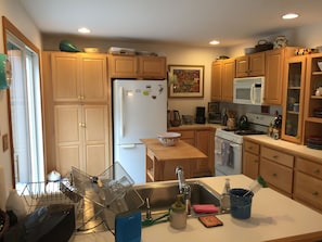 kitchen area - with dishwasher. Door to back deck.