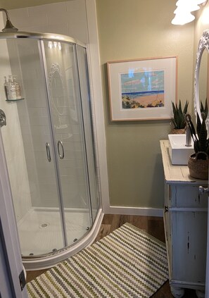 Beautiful clean space to start and end your days. Tankless hot water heater.