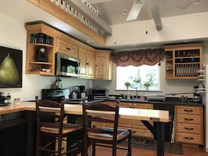 Wonderful Knotty Alder kitchen appointed with all the bells and whistles 