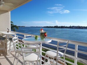 Spacious balcony offers unbeatable panoramic water views.  Lots of seating too!