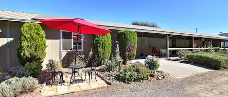 Perfect outdoor area to read and enjoy a bottle of wine from a local vineyard, enjoy living next to the horses!