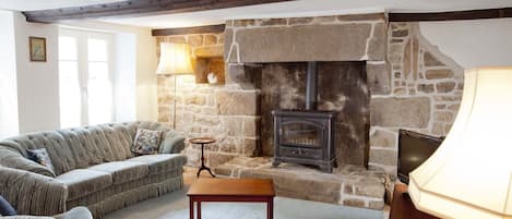 Sitting Room with old Norman fireplace