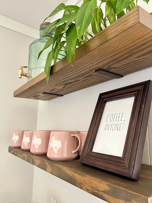 Coffee’s on us! Coffee bar features a Keurig, regular coffee maker & more!