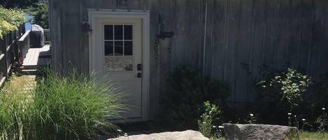 Welcome to Tidewatch! This is the view of the house when pulling into the driveway.