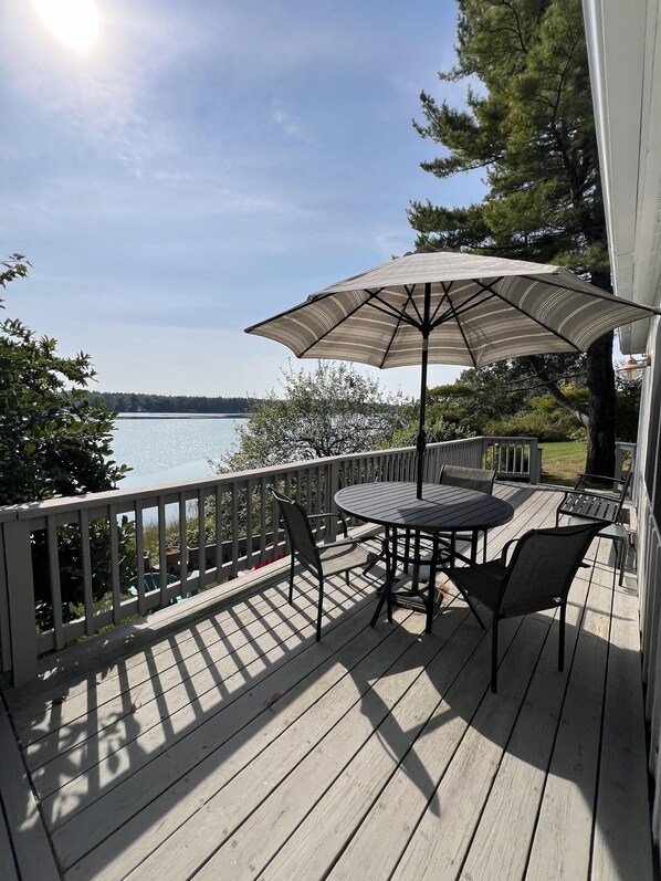Have breakfast, lunch and dinner out on the large expansive deck overlooking Basin Cove.